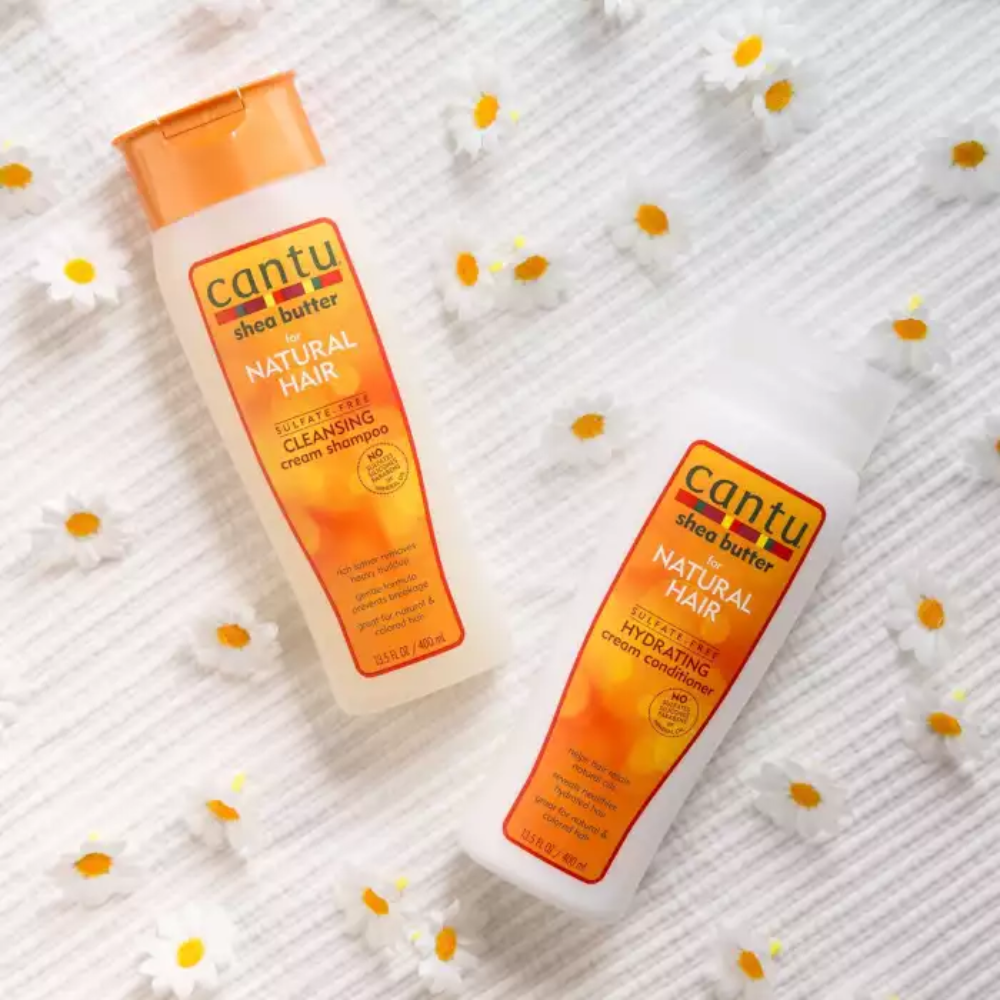 Cantu hydrating cream conditioner with shea butter for natural hair, 400 ml bottle, smooths and nourishes curly and textured hair.