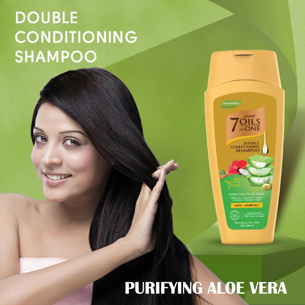 Emami 7 Oils in One Double Conditioning Shampoo with aloe vera, 400ml, showing the shampoo bottle with aloe vera plant in the background.