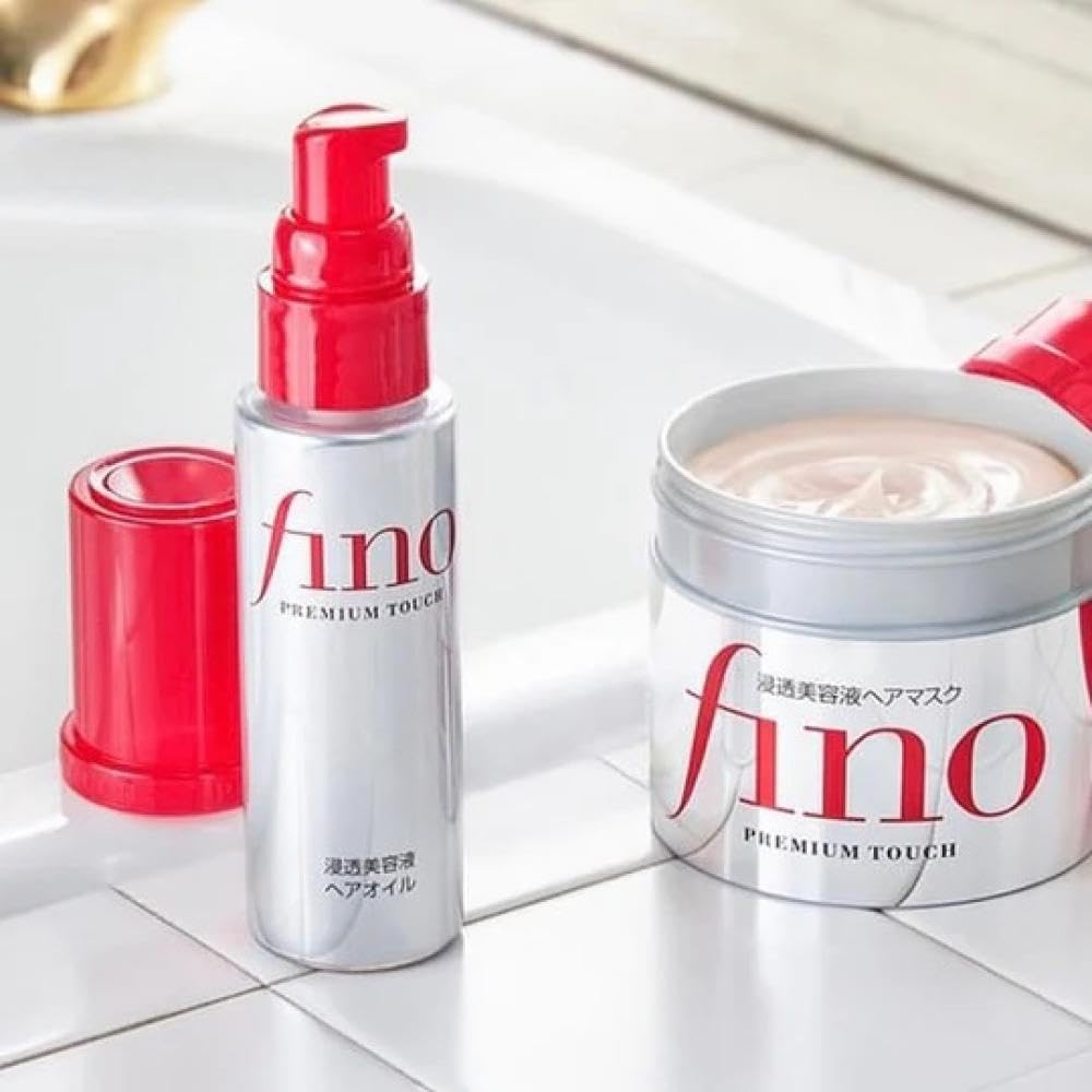 Fino Fino Premium Touch Hair Oil bottle with applicator tip, 70ml, hair care product for smooth, shiny hair.
