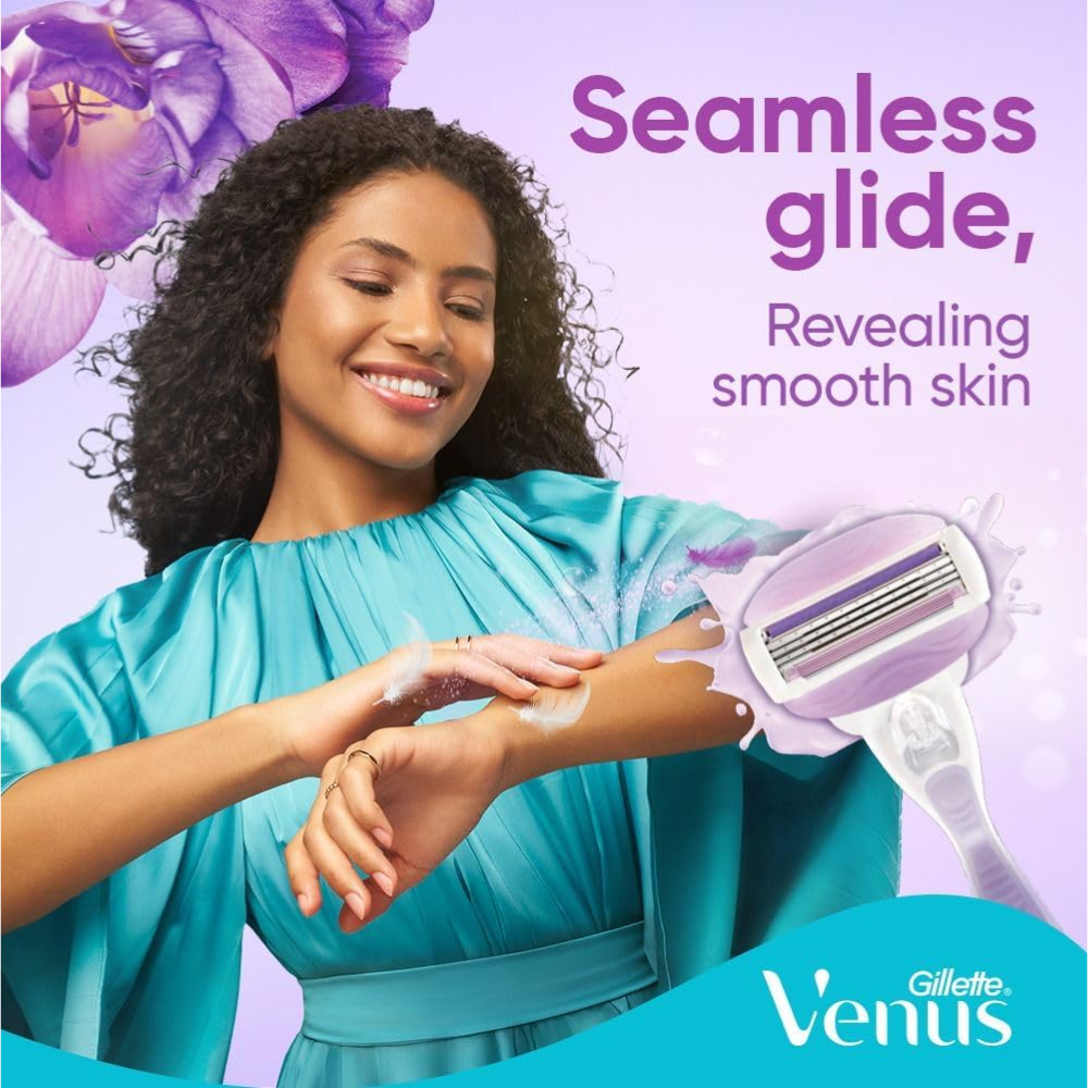 Gillette Venus ComfortGlide Breeze 3-blade razor blade refills for women, pack of four, designed for smooth body shaving.