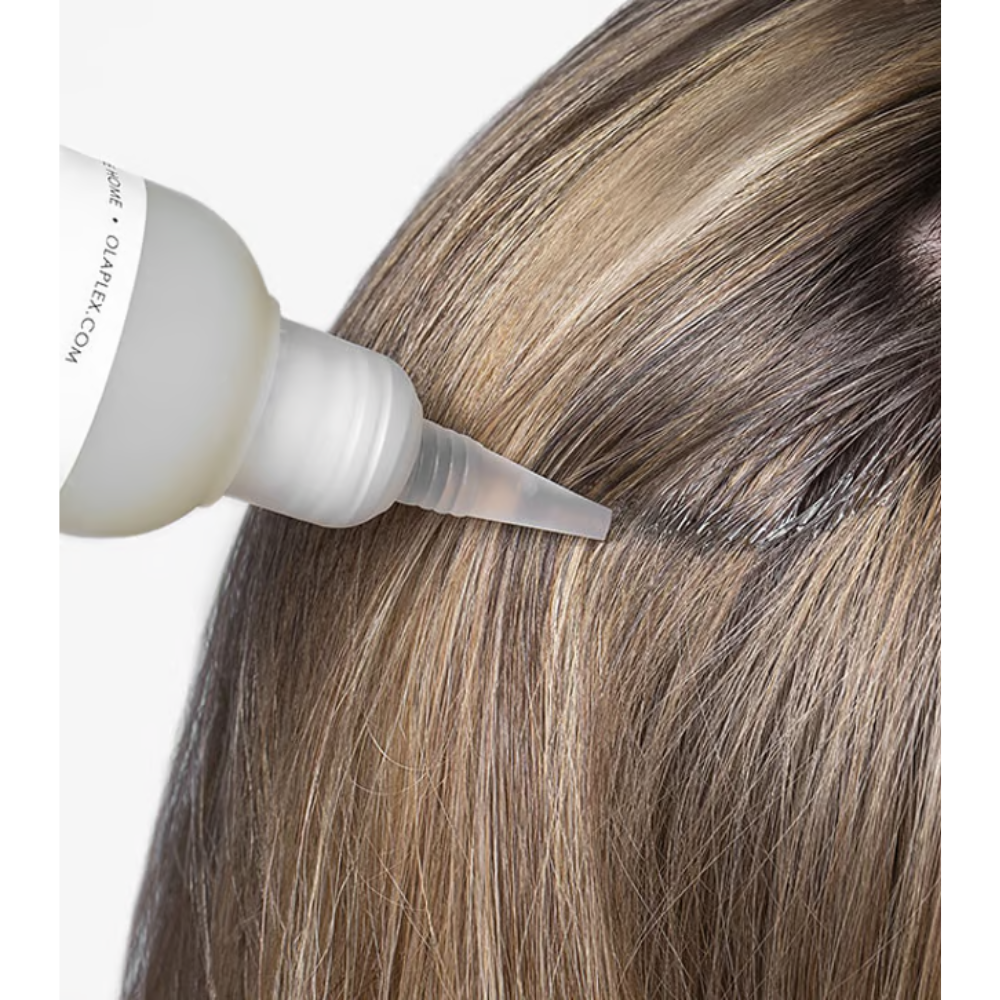 Olaplex No. 0 Intensive Bond Building Hair Treatment 155mL, bottle of hair care treatment for strengthening and repairing hair.