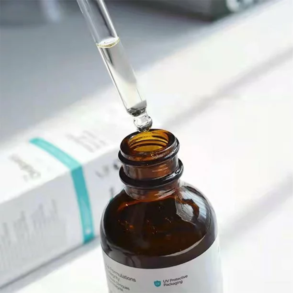 The Ordinary Multi Peptide Serum for Hair Density in 60 ml bottle, featuring a clear liquid formula in a sleek bottle.
