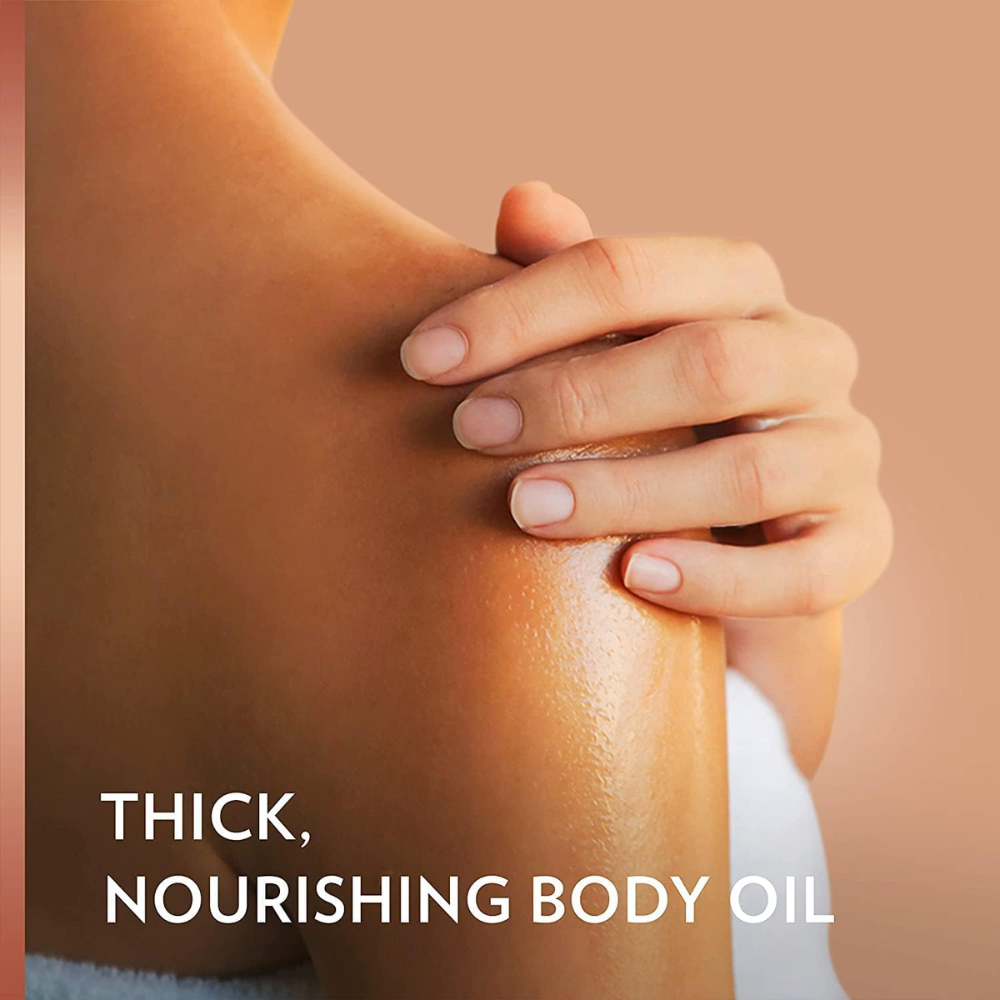 Vaseline Intensive Care Cocoa Radiant Body Oil with pure cocoa butter in a 200ml bottle, designed for nourishing skin.