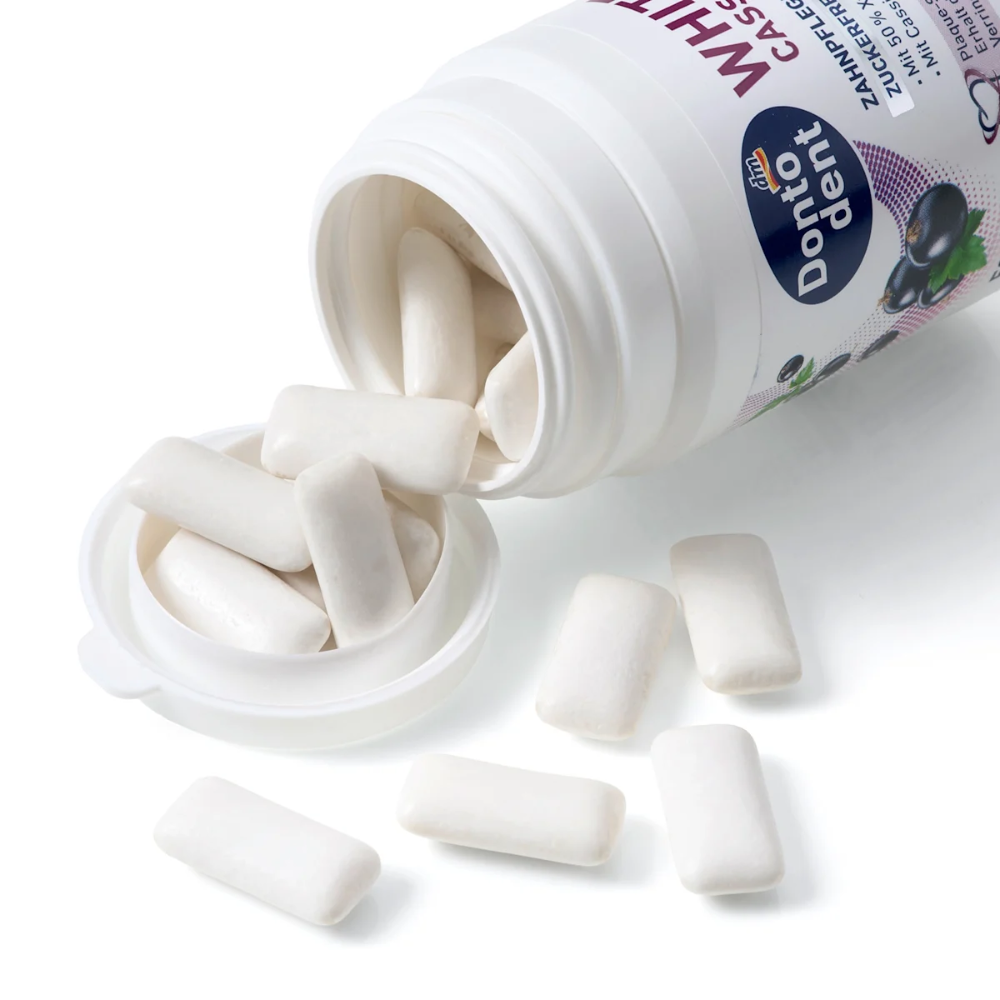 dontodent White Cassis sugar-free gum pack with 50 pieces, dental care chewing gum in colorful packaging